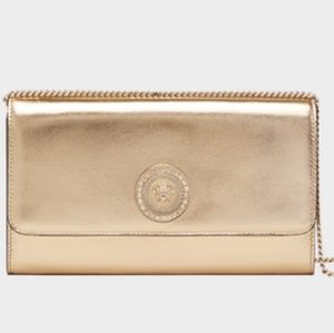 New versace gold clutch